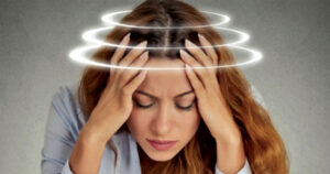 Woman suffering dizziness,symptom of vertigo